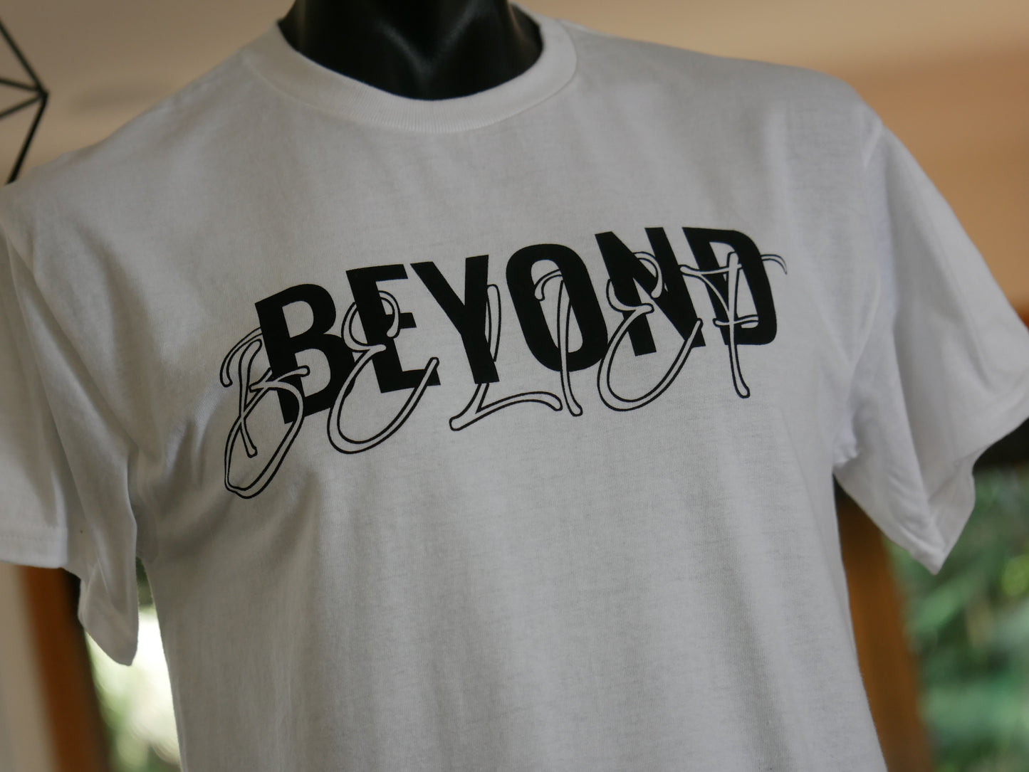 beyond belief logo tee