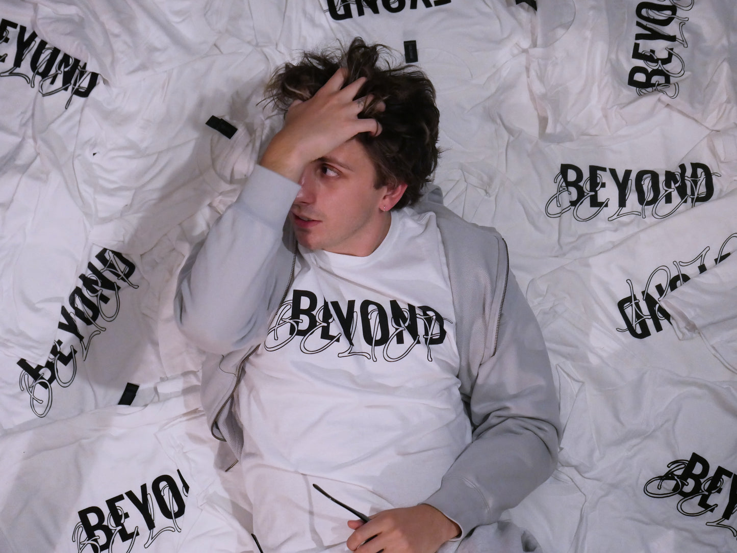 beyond belief logo tee